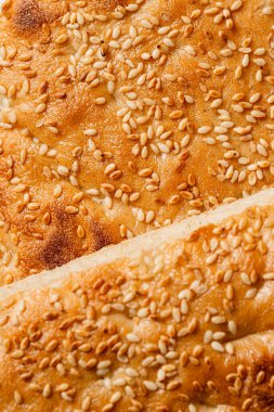 Susamlı çöreğin dokusu makro yakın çekim.