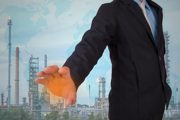 Businessmen with oil refinery — Stock Photo, Image