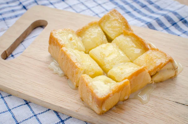 Butter toast with sweet milk — Stock Photo, Image