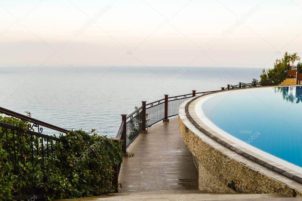 View of the sea and the pool in the Turkish hotel Utopia World. Alania. Turkey
