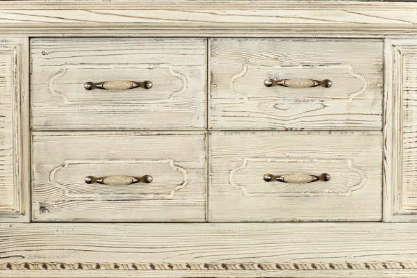 Part of an old wwhite wooden cupboard — Stock Photo, Image