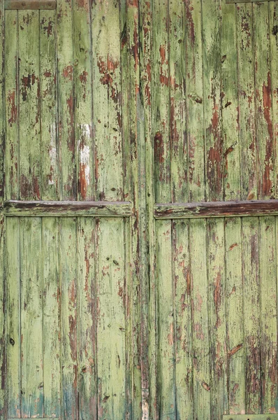 Stare zielone drewniane drzwi — Zdjęcie stockowe
