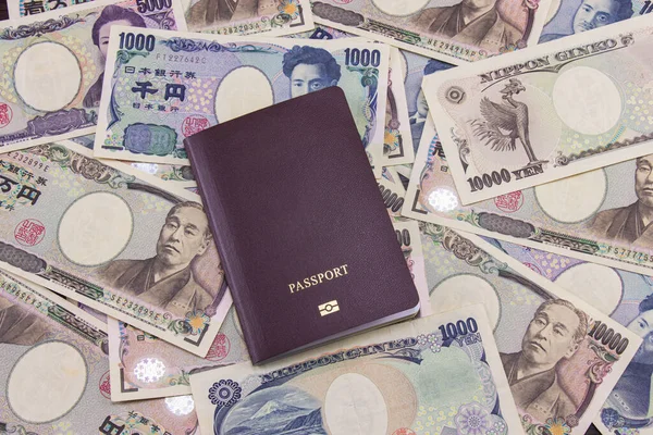 International passport on japanese currency notes background, Financial business of japanese money.