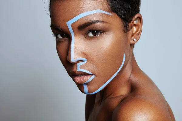 Woman with blue line on face — Stock Photo, Image