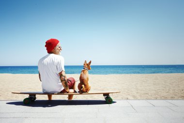 Man on beach with dog clipart