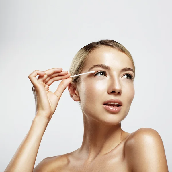 Woman with cotton swab — Stock Photo, Image