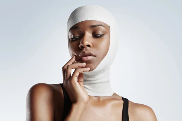 Woman with bandaged head — Stock Photo, Image