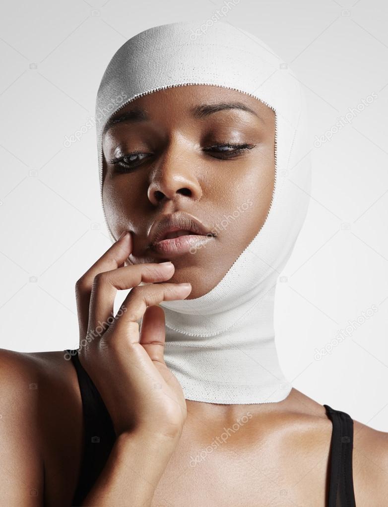 Woman with bandaged head