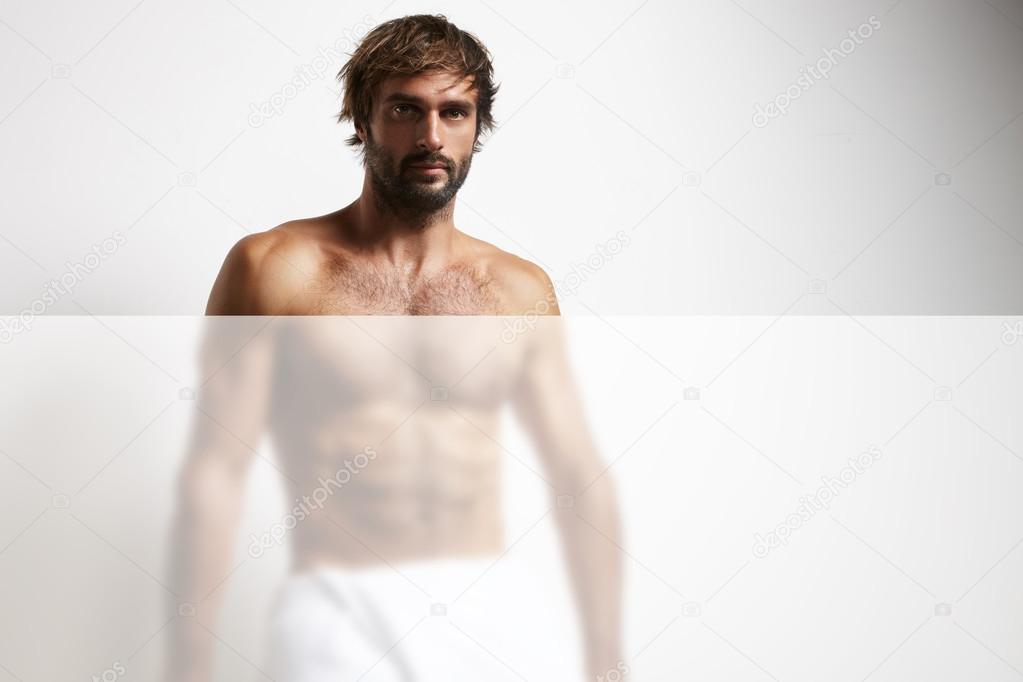 Strong man in towel