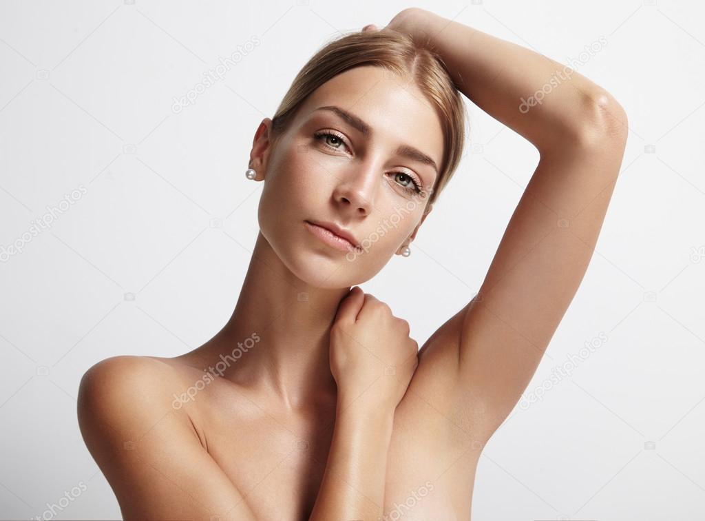 Woman showing her armpit