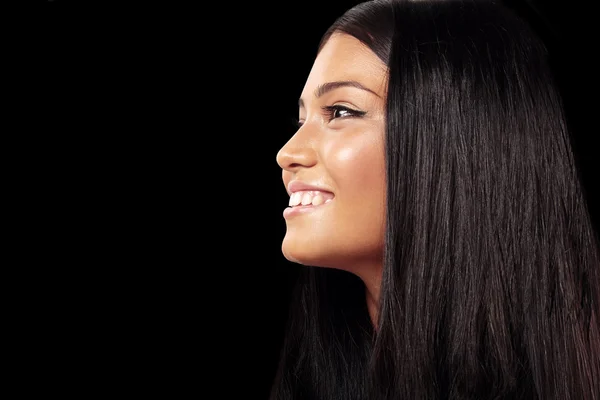 Mujer sonriente con el pelo largo — Foto de Stock