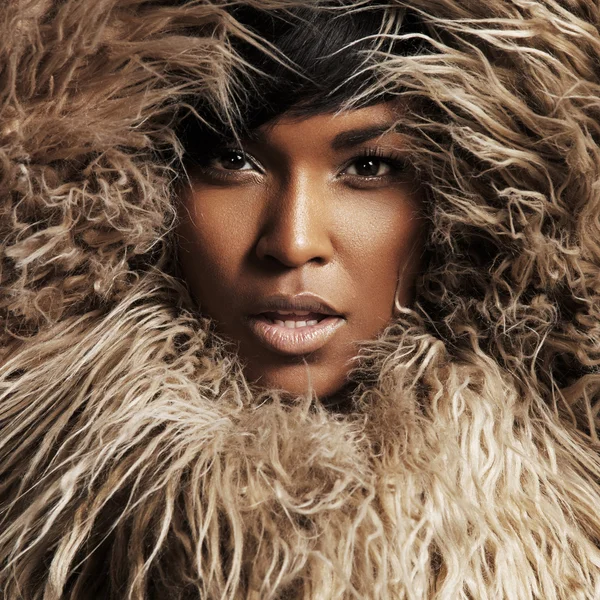 Woman face into fur — Stock Photo, Image