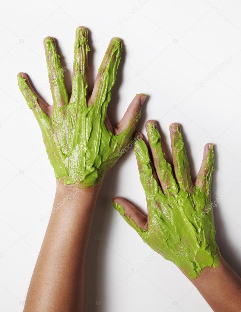 Avocado mask on woman hands