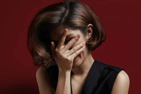 Woman cover face with hand — Stock Photo, Image