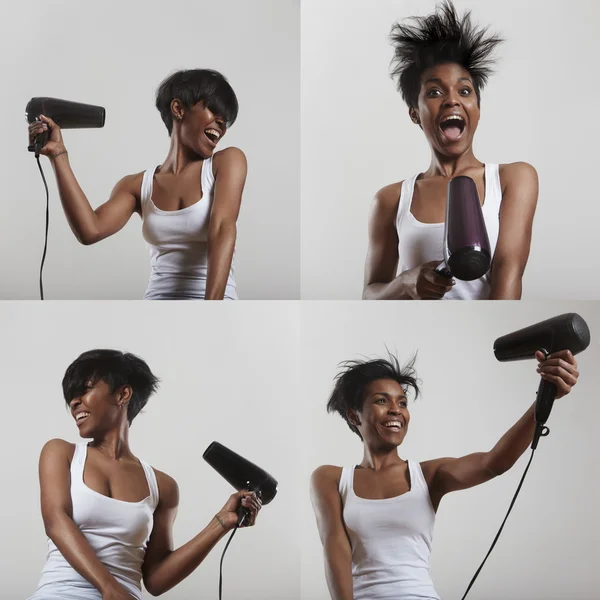 Menina gritando com secador de cabelo — Fotografia de Stock
