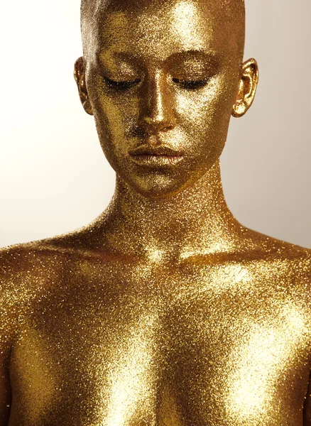 Woman with gold skin — Stock Photo, Image