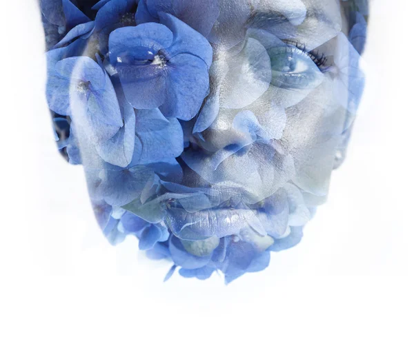 Woman's face double exposure with flowers — Stok fotoğraf