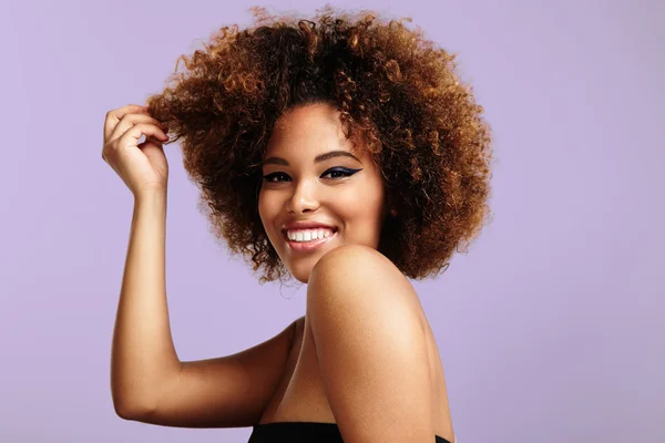 Woman  touching hair — Stock Photo, Image