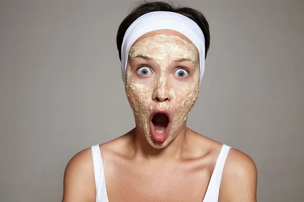 Woman have fun with facial treatment — Stock Photo, Image