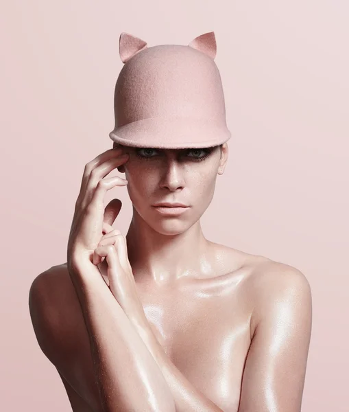 Woman wearing pig hat — Stock Photo, Image