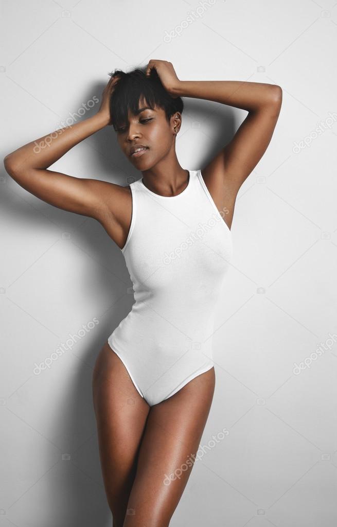 Stunning woman wearing body suit Stock Photo by ©kazzakova 84831996