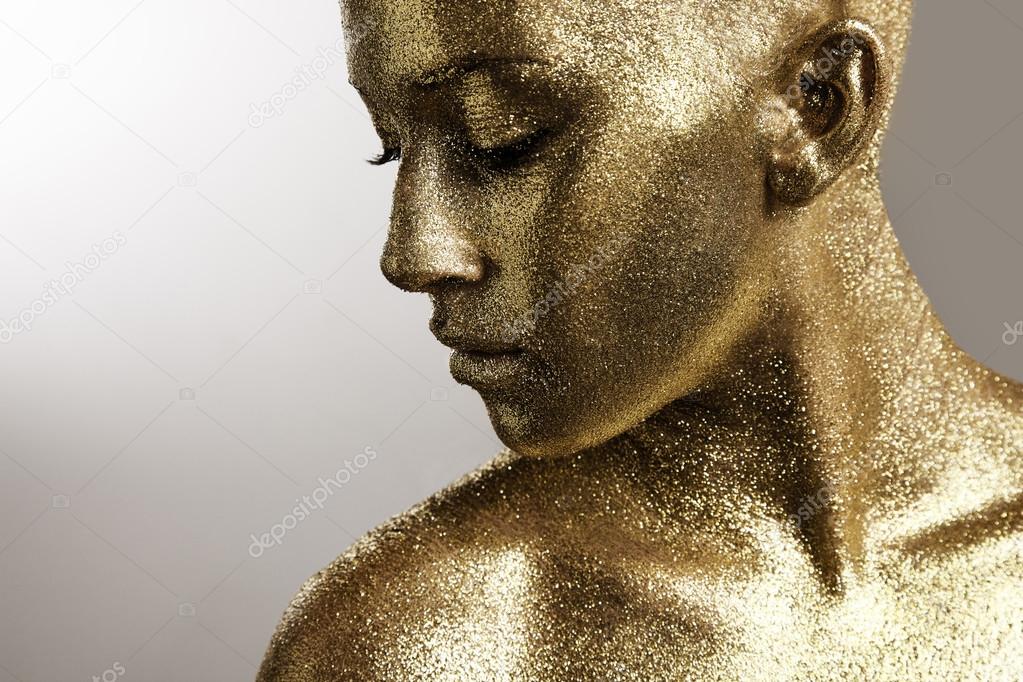 Woman with golden skin
