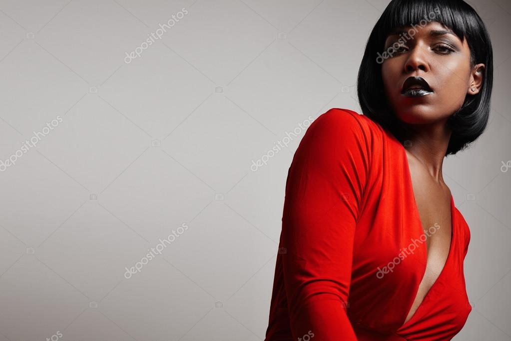 Microprocessor Mount Bank thousand Black woman wearing red dress Stock Photo by ©kazzakova 95994228