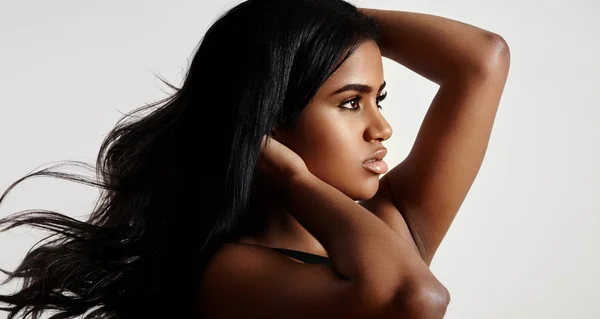 Latin woman with blowing hair — Stock Photo, Image