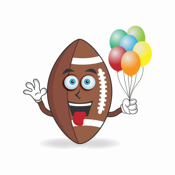 American Football Maskottchen Charakter Hält Einen Luftballon Vektorillustration — Stockvektor