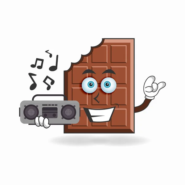 Personaje Mascota Chocolate Sosteniendo Una Radio — Archivo Imágenes Vectoriales