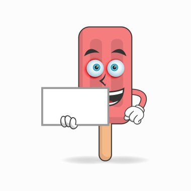 Kırmızı dondurma maskotu karakteri elinde beyaz bir karatahta tutuyor..