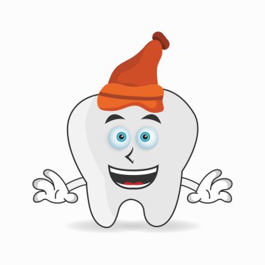 Diş maskotu karakteri şapka takıyor..