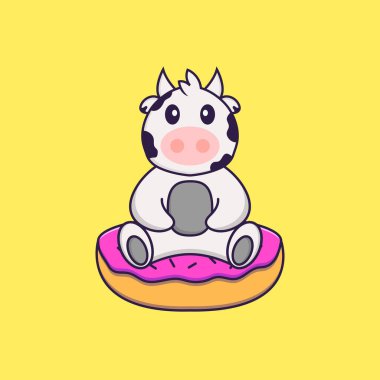 Tatlı inek çöreklerin üzerinde oturuyor. Hayvan çizgi film kavramı izole edildi. Tişört, tebrik kartı, davetiye kartı ya da maskot olarak kullanılabilir..