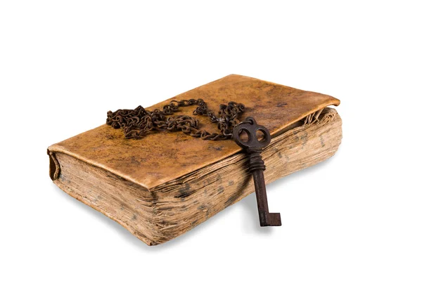 Старый ключ с книгой — стоковое фото