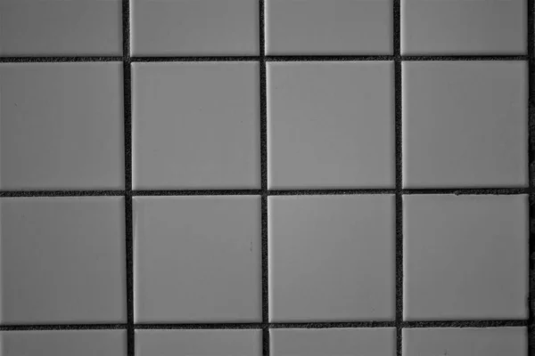 방사상적 흑백의 네모난 타일과 타일의 — 스톡 사진