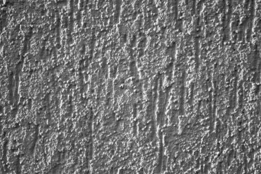 Antik duvarın alçı dokusunun anımsatıcı siyah beyaz görüntüsü 