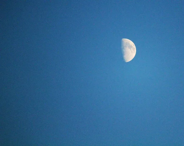 evocative image of a moon phase of the moon up in the sky