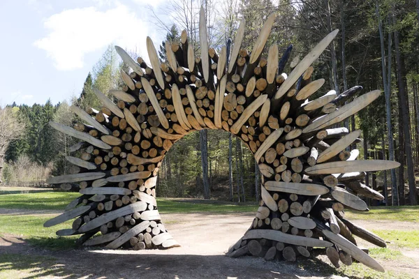 Borgo Valsugana, Trento, Italy, April 2019: Handmade artistic wooden strucure, artistic forest in trentino alto adige