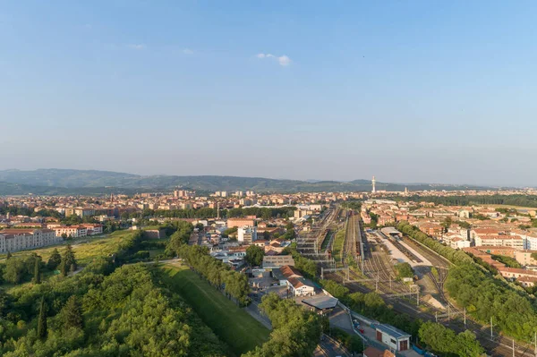 VERONA, ITALY : Aerial view of suburbs, container terminal on a railway with open storage area.