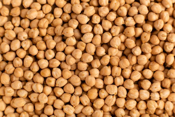 生のひよこ豆の背景クローズアップトップビュー 食感食品の背景 — ストック写真