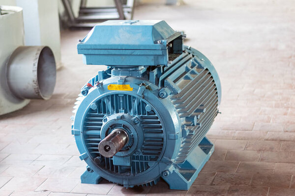 Industry. High power electric motor without belt pulley. Close-up.