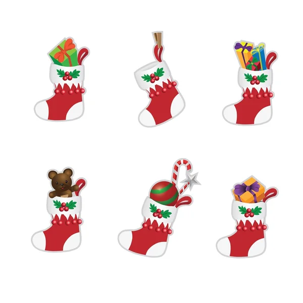Christmas socks with gifts hanging — Stock Vector