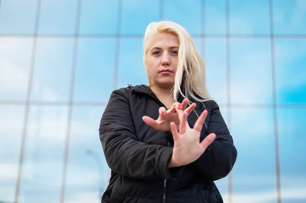 Emotional deaf and dumb woman talking sign language outdoors. — ストック写真