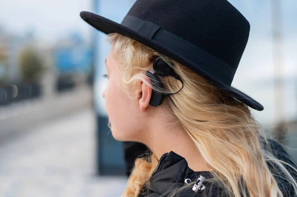 Portrait of a blonde woman wearing a Hearing Aid — Stock Photo, Image