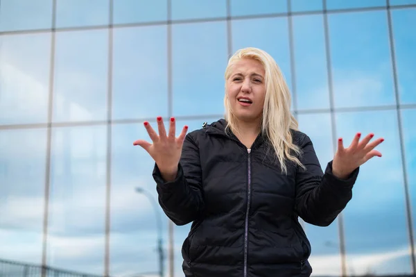 Emotional deaf and dumb woman talking sign language outdoors. — Stockfoto
