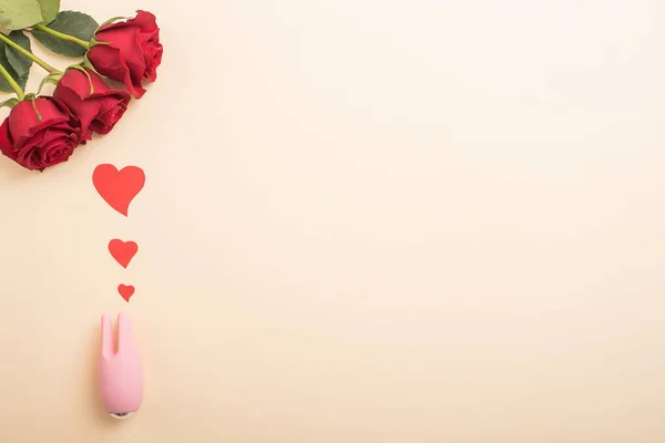 Roses hearts and a clitoral vibrator. Empty space for text — Stock Photo, Image