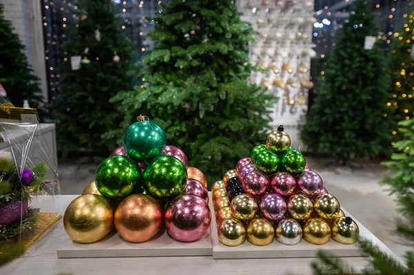 Christmas balls on the stand. Close-up of Christmas toys in a store — Stock Photo, Image