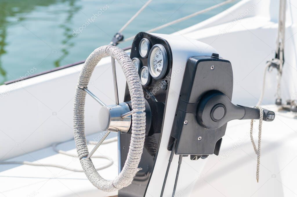 Close-up of a yacht steering wheel.