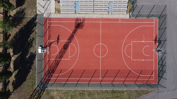 Top view of the basketball field. Shooting from a drone