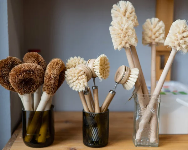 Eco brushes made of coconut. Household products without plastic waste in an eco friendly store